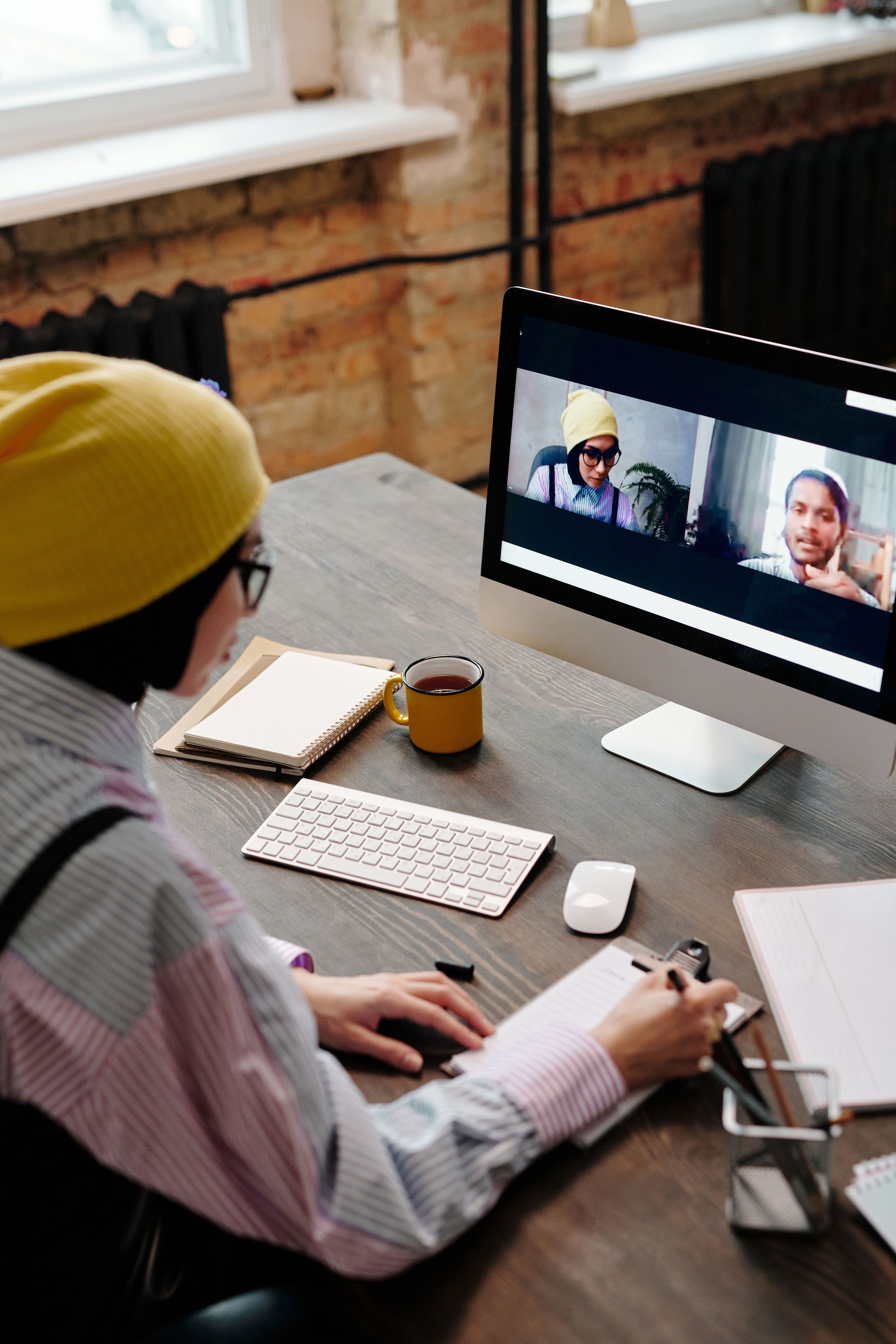 Client completing a remote online notarization via secure video call